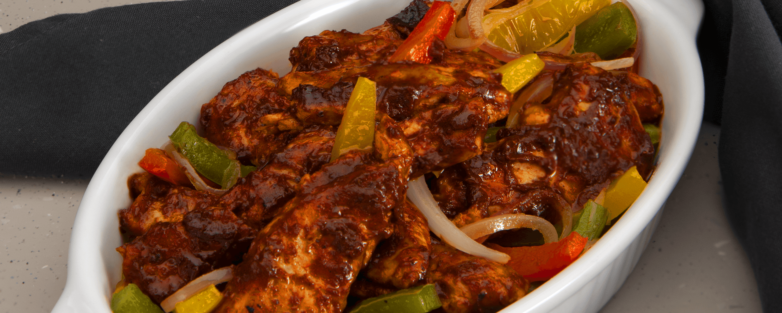 Imagen de Fajitas de pollo marinada en Chilpotle con ciruela